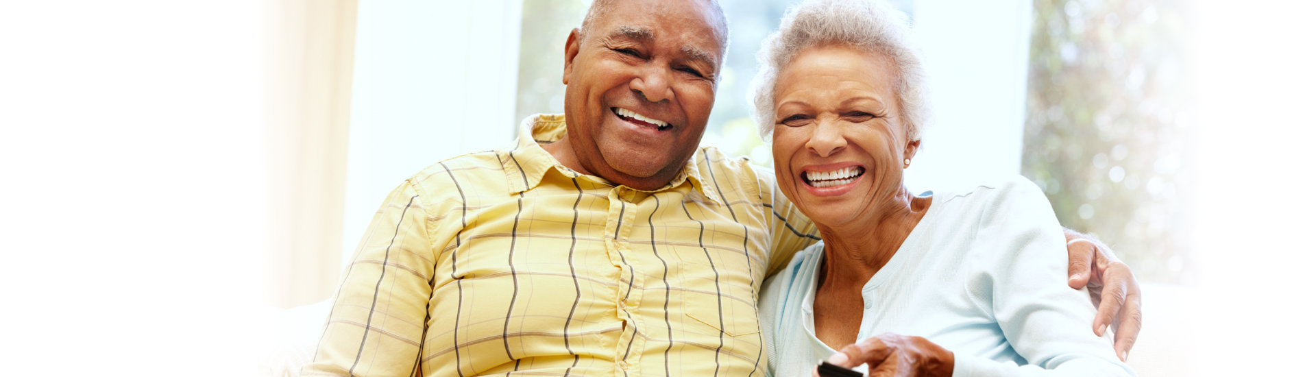 elderly couple smiling